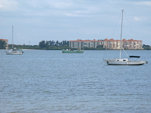 Day 27 Of The Law Of Attraction was cloudy and overcast, yet there were still people out at the beach and on their boats.