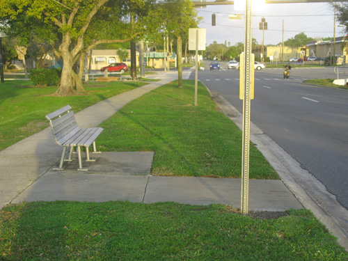 I chose to leave one dollar at a bus stop near some apartments by the park.