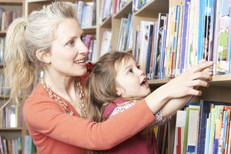 Finding a $5 dollar bill in a child development book would be quite a nice surprise for a young mother.