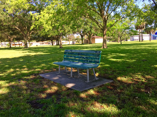 I leave $5 dollar bills in park benches and at bus stops.